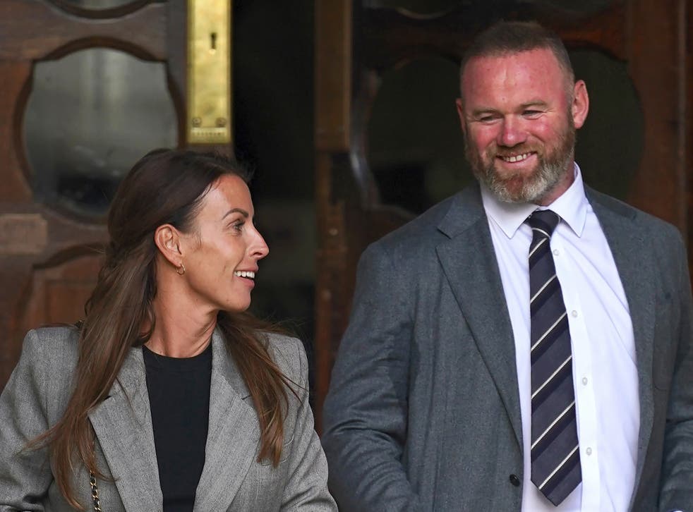 Coleen and Wayne Rooney leaving the Royal Courts Of Justice, London (Yui Mok/PA)