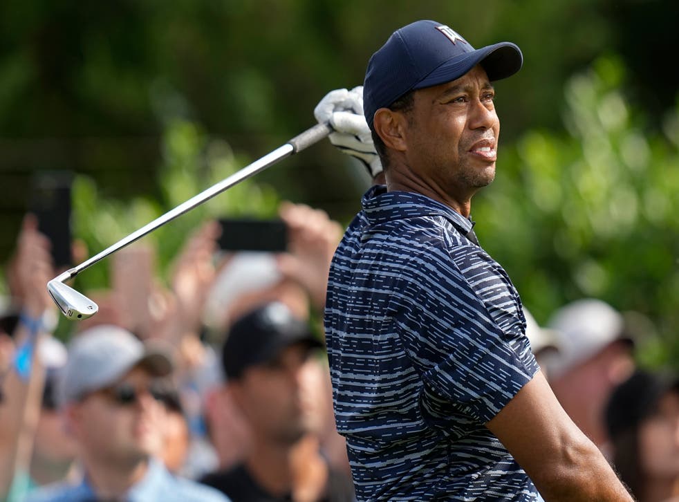 Tiger Woods watches his shot on the 15th hole during an opening 74 in the US PGA Championship golf (Eric Gay/AP)