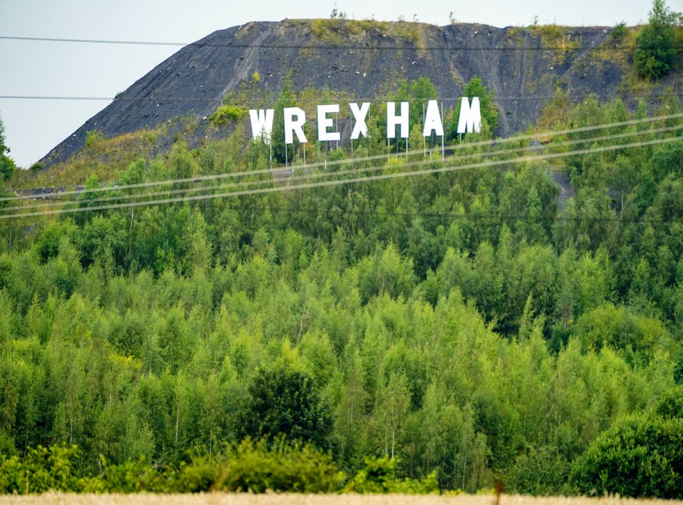A large sign for Wrexham, in the style of the Hollywood sign in Los Angeles (PA)