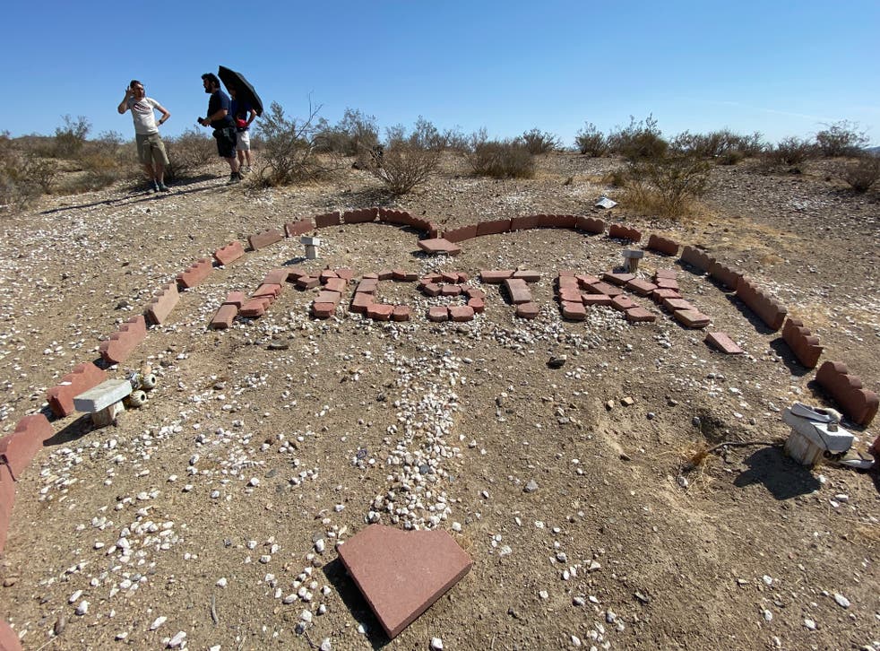 <p>A memorial adorns at the gravesites where the McStays were found nearly four years after they mysteriously vanished</p>