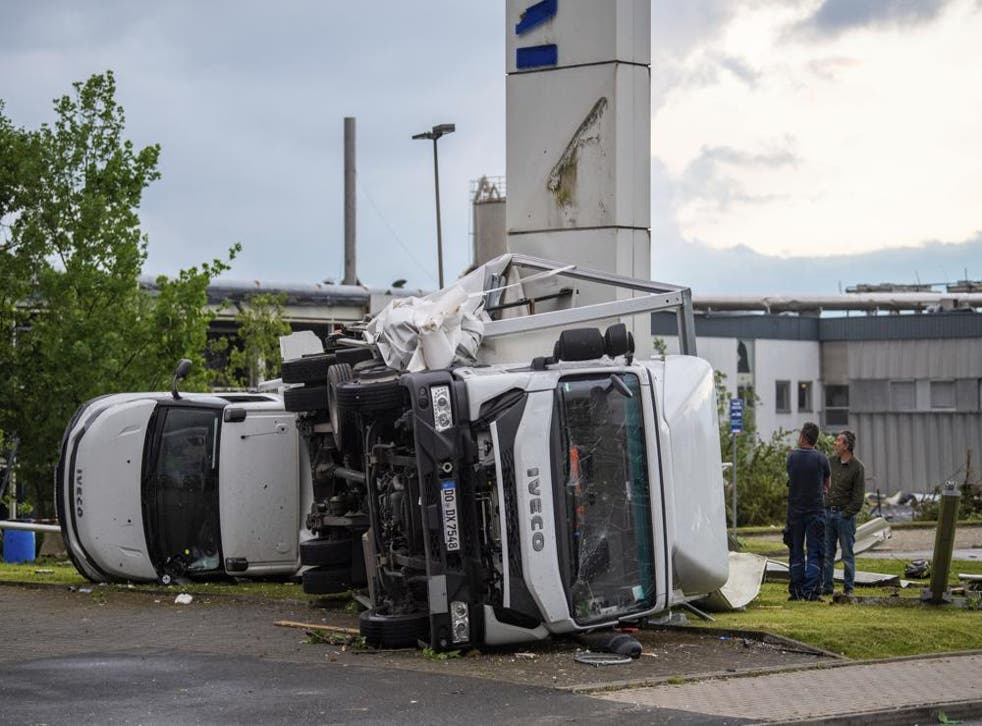<p>Two trucks oveturned in Paderborn after high winds hit western Germany </bl>