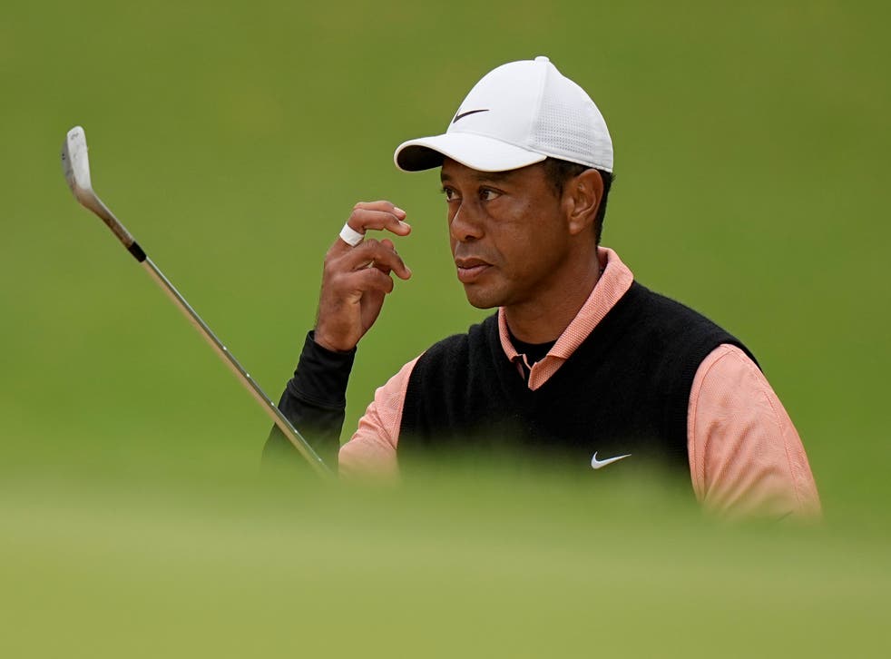 Tiger Woods watches his shot to the green on the 17th hole during the third round of the US PGA Championship (Eric Gay/AP)