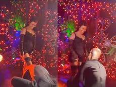 Travis Barker removes Kourtney Kardashian’s garter with his teeth during wedding 