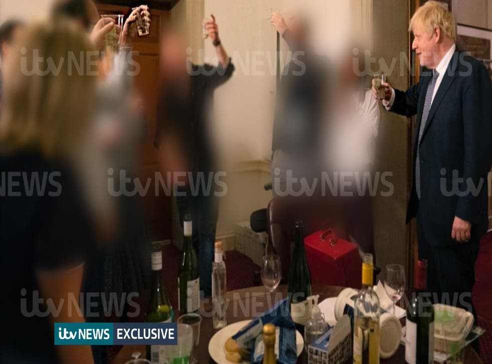 The Prime Minister raising a glass at a leaving party on November 13 2020 (ITV/PA)