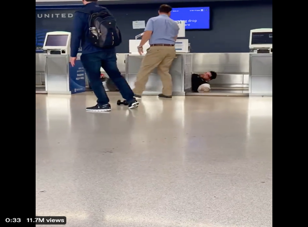 <p>A United Airlines worker and a passenger got into a fist fight at Newark International Airport, leading to the employee getting knocked over the check-in desk and onto the conveyor belt.</p>