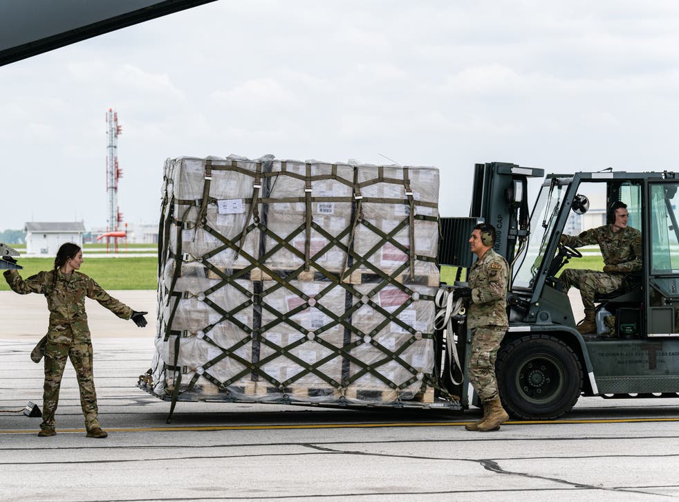 <p>Airmen unload pallets from the cargo bay of a U.S. Air Force C-17 carrying 78,000 lbs of Nestle Health Science Alfamino Infant and Alfamino Junior formula from Europe at Indianapolis Airport on May 22, 2022 in Indianapolis, Indiana</p>