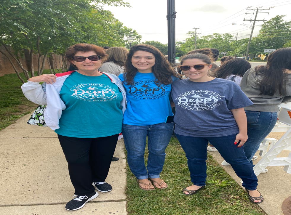 <p>Camille and her daughters Britney and Ashley wear t-shirts with quotes from Johnny Depp’s now-in famous testimony</p>