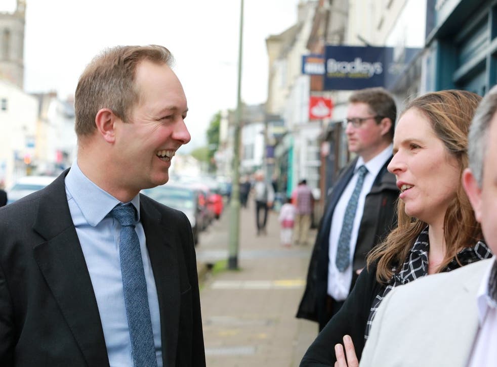 <p>Lib Dem candidate Richard Foord talks to voters in Honiton</s>