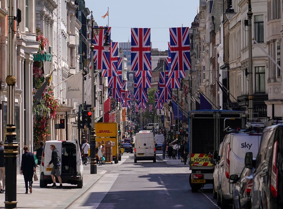 <p>New Bond Street is decorated with Union flags in London</p>