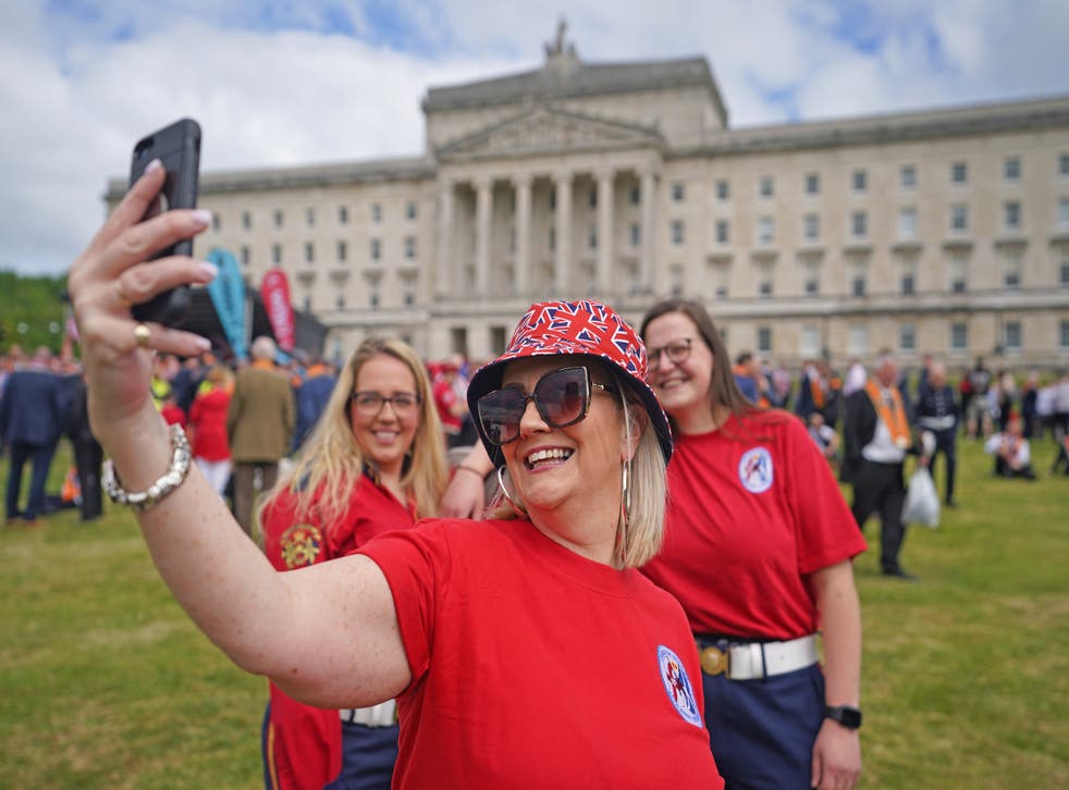 People gather at Stormont (Niall Carson/PA)