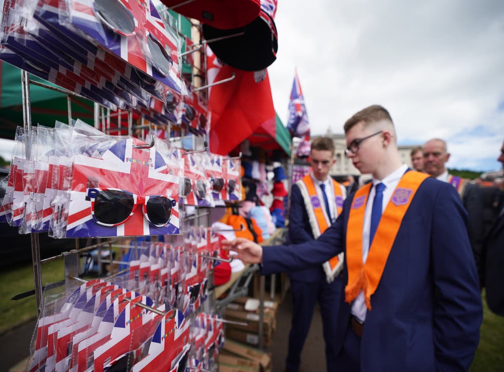 Merchandise on sale at Stormont before the start of the Northern Ireland centenary parade (Niall Carson/PA)