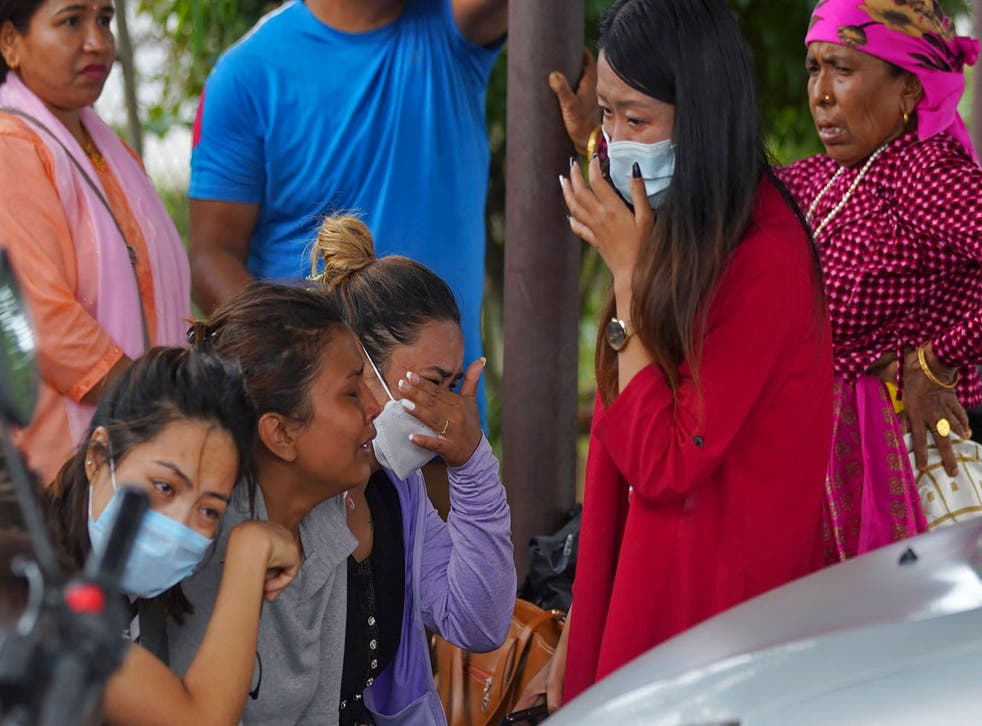<p>Family members and relatives of passengers on board the Twin Otter aircraft operated by Tara Air weep outside the airport in Pokhara on 29 Maio<pp>