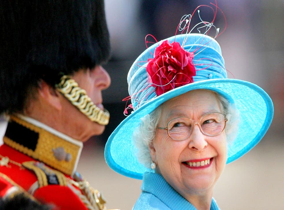 The Queen smiles at the Duke of Edinburgh on Horse Guards Parade during a Trooping the Colour parade (Lewis Whyld/PA)