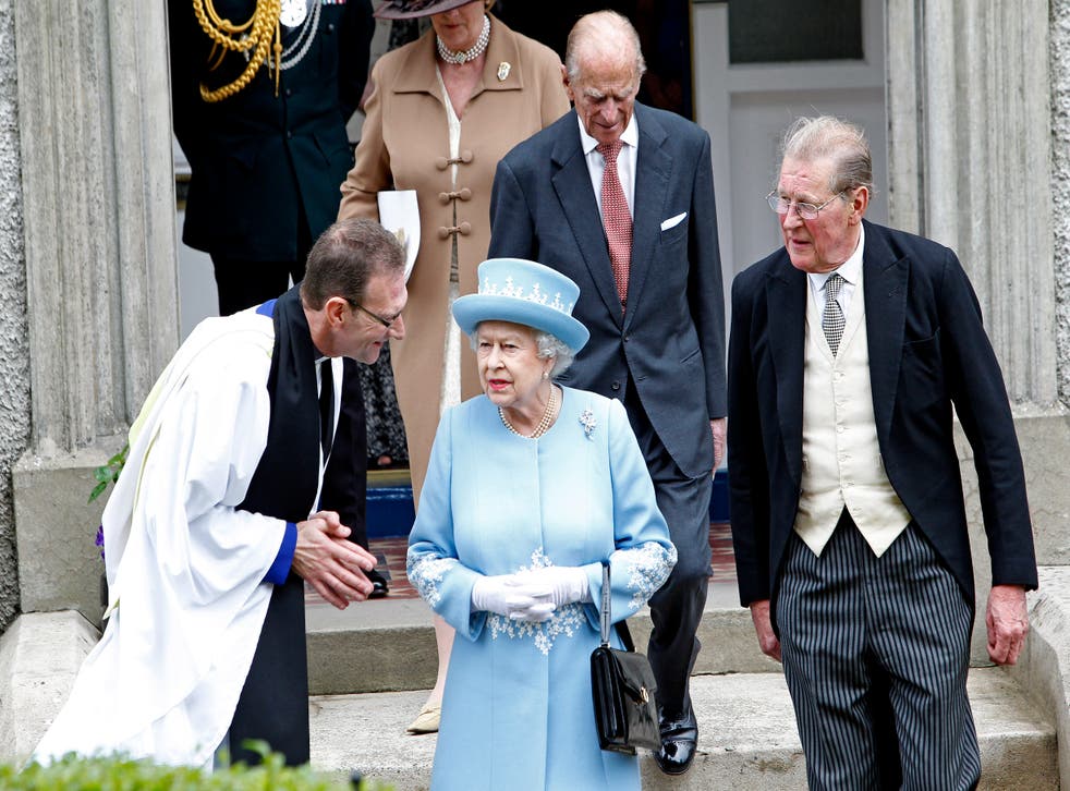 Queen Elizabeth II and the Duke of Edinburgh at St Macartin’s Cathedral in Enniskillen, County Fermanagh in 2012 (PA)