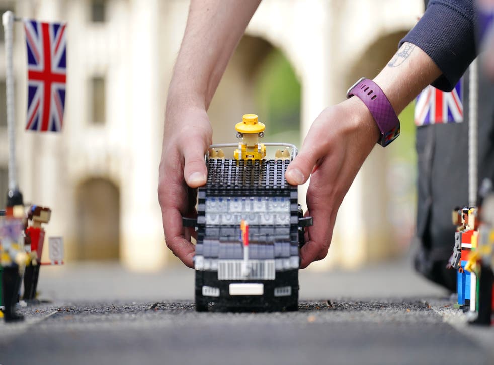 The Queen in Lego form makes a journey down The Mall (Jonathan Brady/PA)