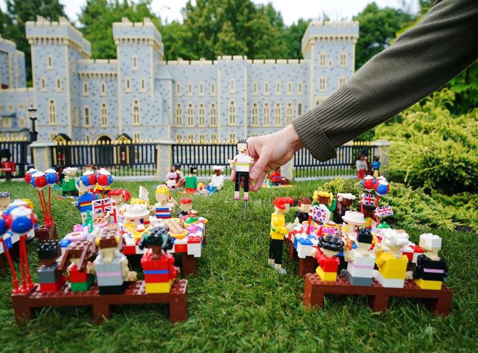 A Lego figure in a display recreating a Platinum Jubilee picnic scene in front of Windsor Castle (Jonathan Brady/PA)