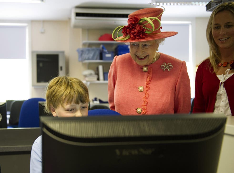 The Queen wearing embellishments on her hat during a visit to St George’s School, Windsor, in 2011 (Arthur Edwards/The Sun/PA)
