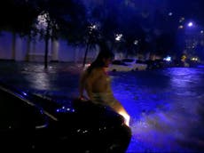 Revellers in flooded Miami filmed partying through tropical storm
