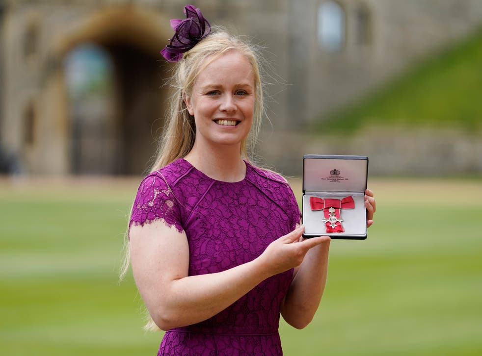 Laura Sugar with her MBE at Windsor Castle (Andrew Matthews/PA)