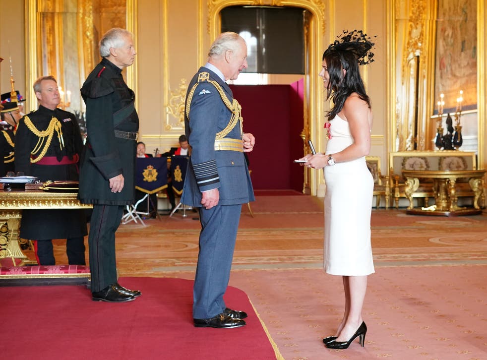 Eve Muirhead is made an MBE and an OBE by the Prince of Wales at Windsor Castle (Jonathan Brady/PA)