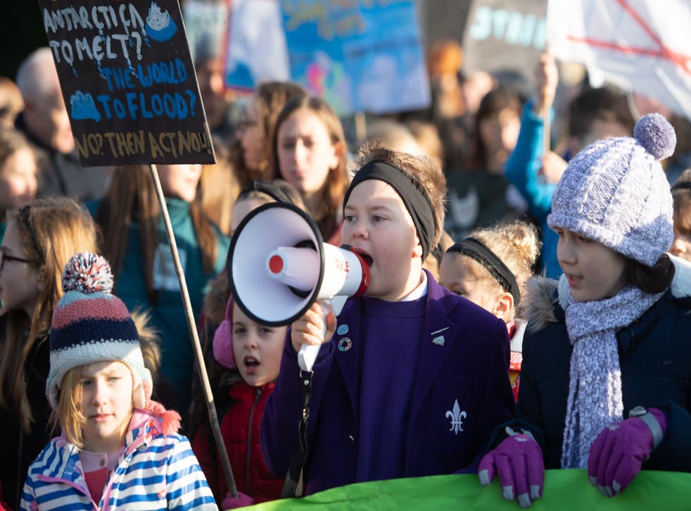 Children take part in the YouthStrike4Climate march (Joe Giddens/PA)
