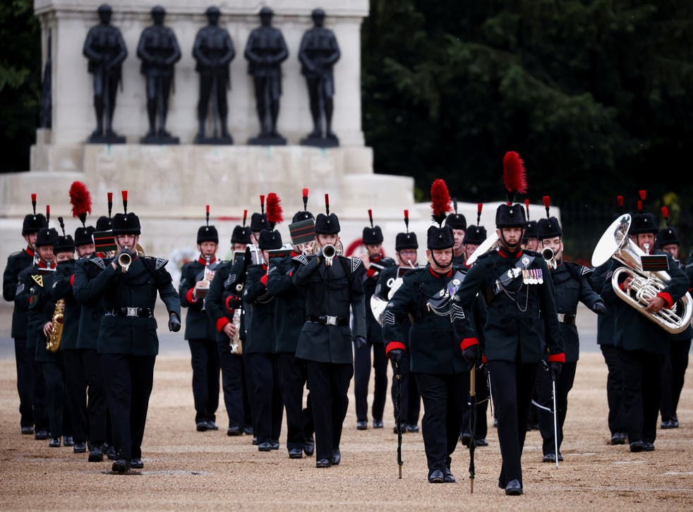Members of The Rifles band perform (Henry Nicholls/PA)