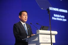Japan vows bigger security role in region to tackle threats