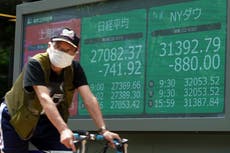 Asian shares sink after inflation-driven retreat on Wall St