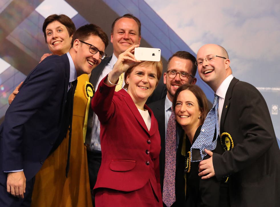 Patrick Grady (vêr regs) with SNP colleagues including Nicola Sturgeon in 2017 (Andrew Milligan/PA)