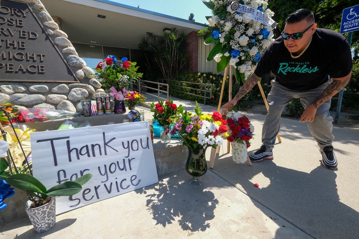 2 Southern California officers killed in shootout at motel