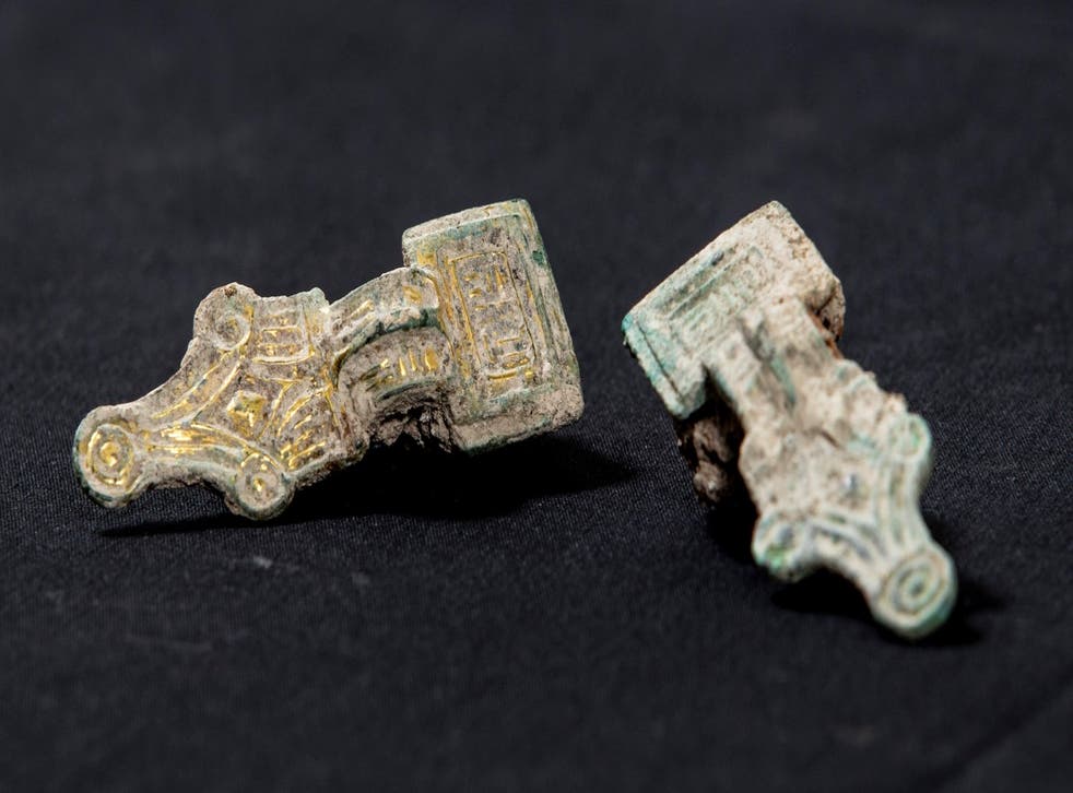 <p>A set of copper alloy small square headed brooches</bl>