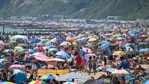 Crowds on Bournemouth beach during a heatwave