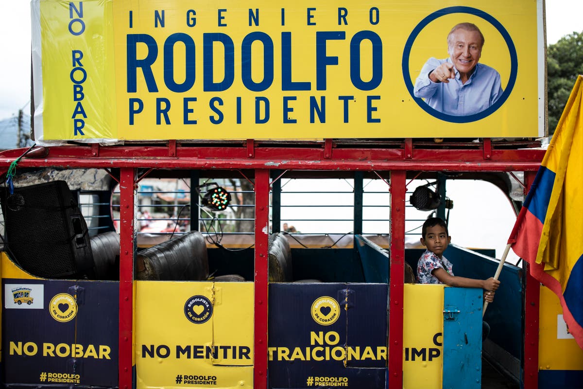 Tight Colombian runoff pits former rebel, millionaire