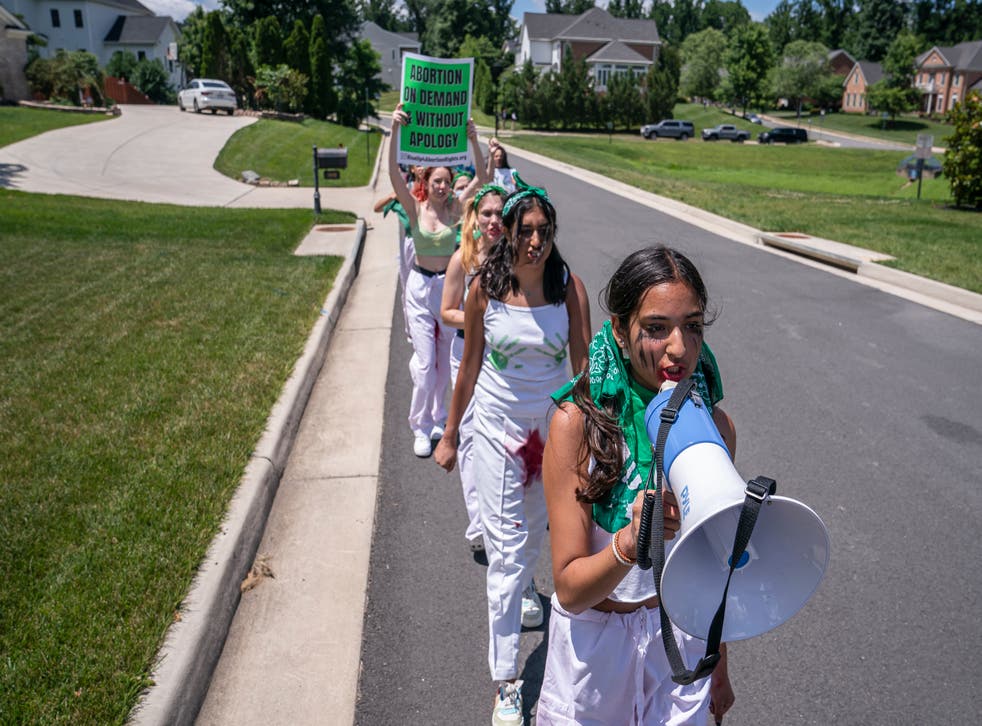 <p>Abortion-rights activists march near the home of Supreme Court Justice Amy Coney Barrett </bl>