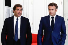 Macron meets rival parties after losing out on parliamentary majority 
