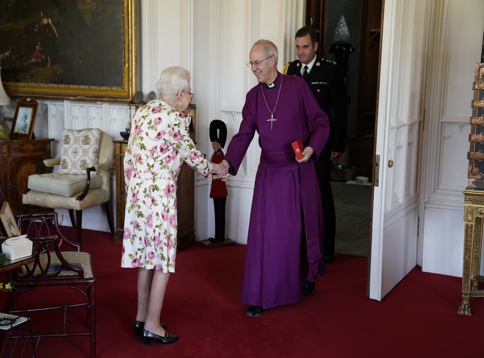 The Queen shakes hands with the Archbishop (Andrew Matthews/PA)