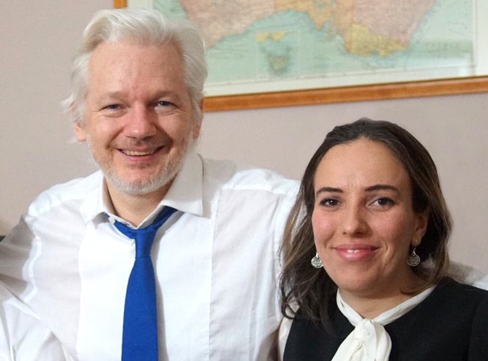 <p>Julian Assange and his wife Stella Moris</p>