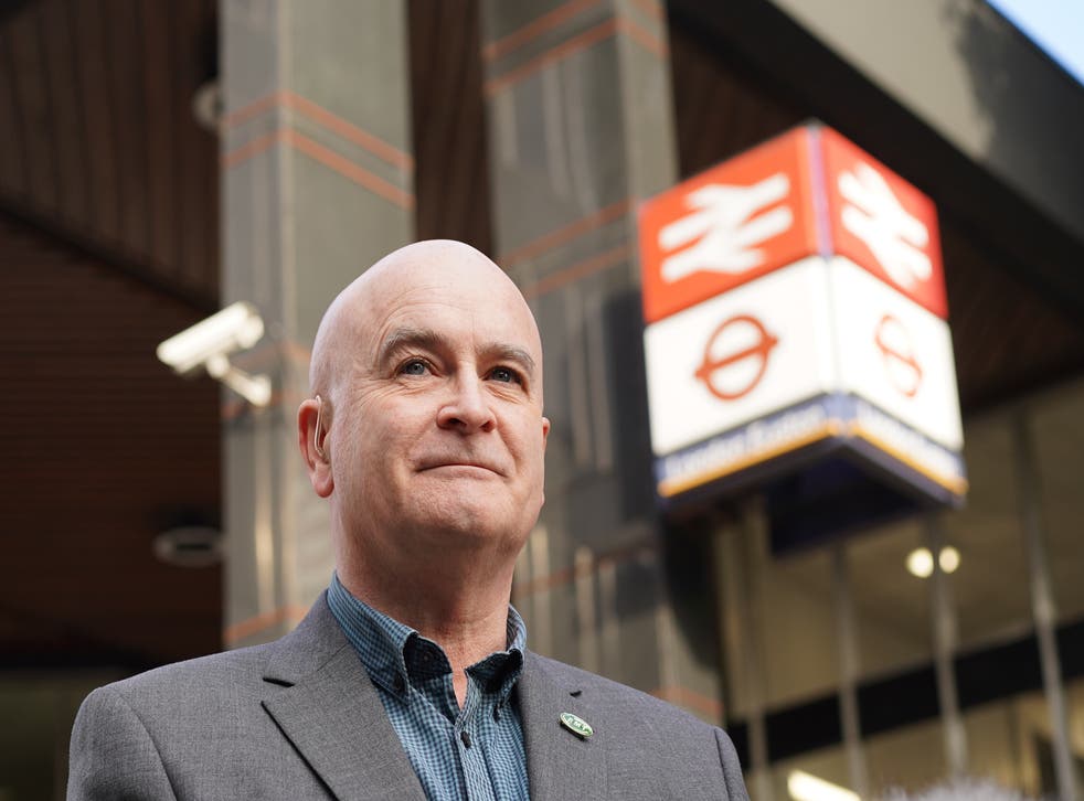 <p>RMT general secretary Mick Lynch on a picket line outside Euston station in London (PA)</s>