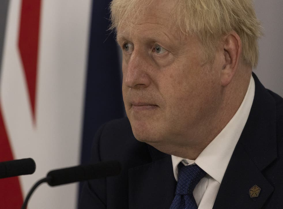 <p>Prime Minister Boris Johnson is facing criticism from opponents and party grandees back in the UK (Dan Kitwood/PA)</磷>