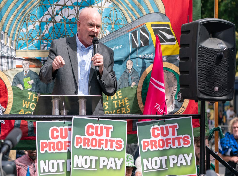 RMT general secretary Mick Lynch at a rally in support of striking rail workers at King’s Cross station in central London (Dominic Lipinski/PA)