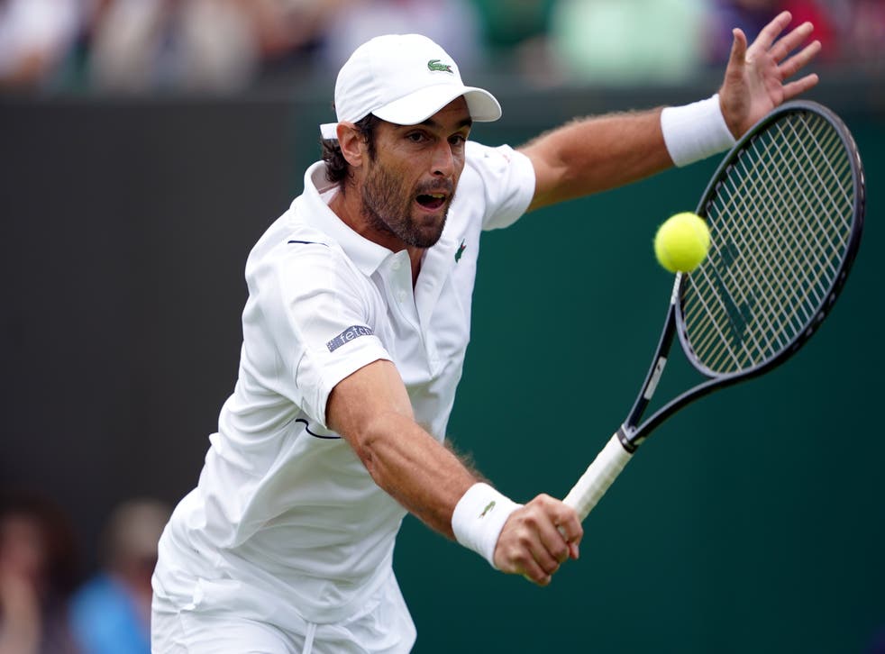 Pablo Andujar in action against Cameron Norrie as Wimbledon 2022 gets under way (Zac Goodwin/PA)