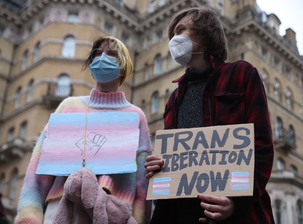 <p>Two trans rights protesters outside the BBC’s headquarters in January 2022</p>