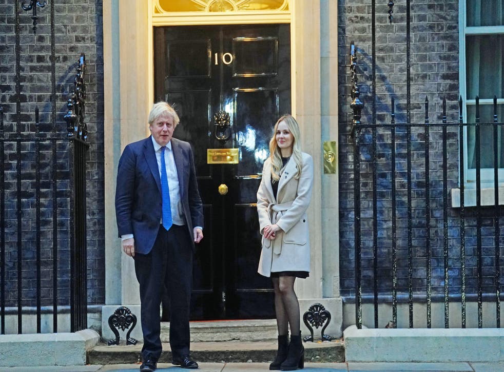 Lissie Harper, the widow of Pc Andrew Harper, stands with Prime Minister Boris Johnson (Victoria Jones/PA)