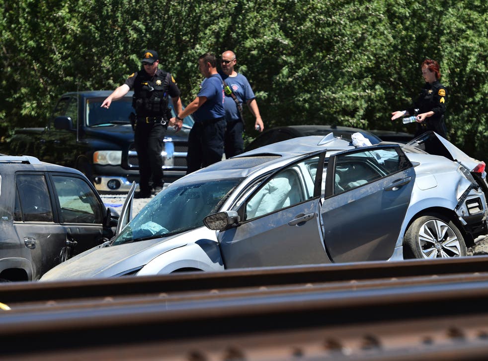 <p>California sheriffs investigate the scene of a collision between an Amtrak train and a passenger vehicle in Brentwood, 26 June 2022</bl>