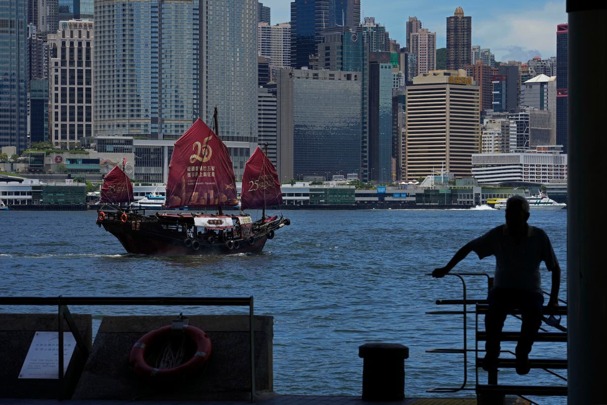Hong Kong burnishes China ties as luster as global hub fades