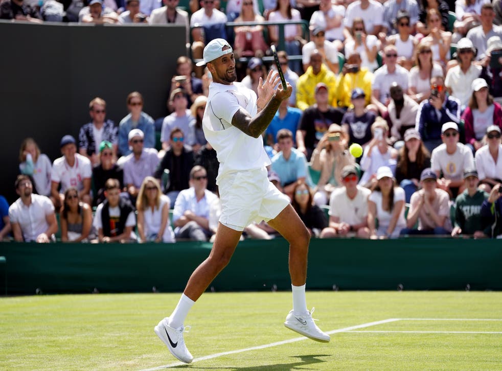 Nick Kyrgios during his match against Paul Jubb on day two of the 2022 Championnats de Wibledon (Adam Davy/AP)