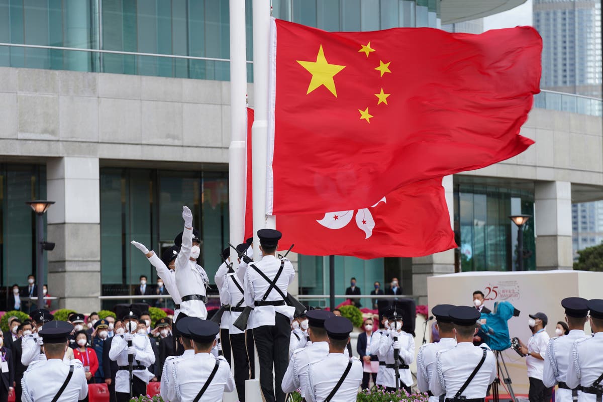 Hong Kong leaders attend flag-raising marking Chinese rule