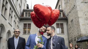 Couples wed as Swiss same-sex marriage law takes effect