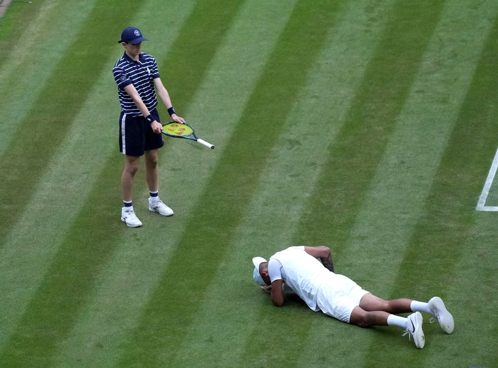 Nick Kyrgios falls to the floor during his third round singles match against Stefanos Tsitsipas (Zac Goodwin/PA)