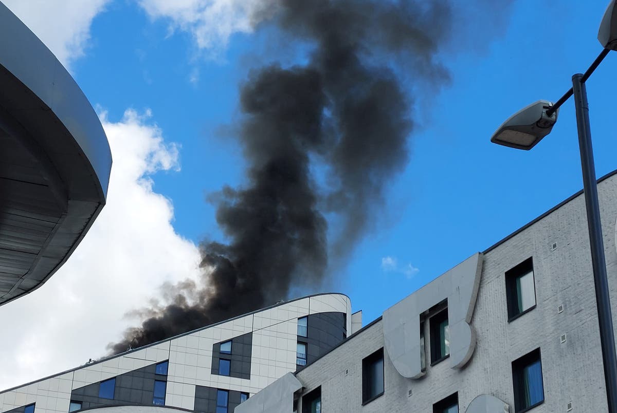 80 firefighters tackling blaze at 17-storey block of flats in London